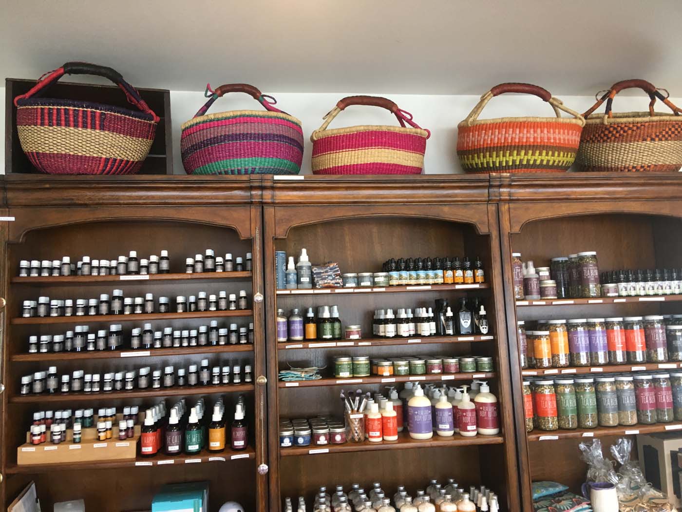 Displaying baskets up high in stores is a very effective use of space