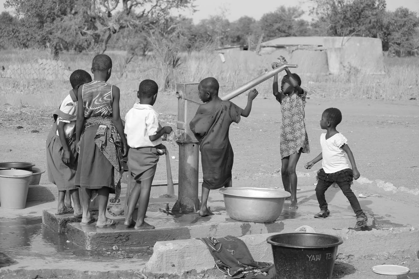Children fetch water from a young age